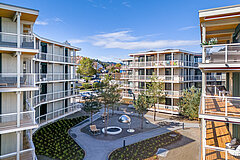 Landscaped courtyard of the certified residential complex in Thalwil 2024